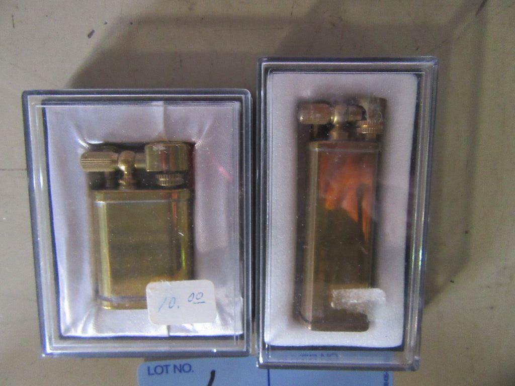 2 LIGHTERS IN CASES