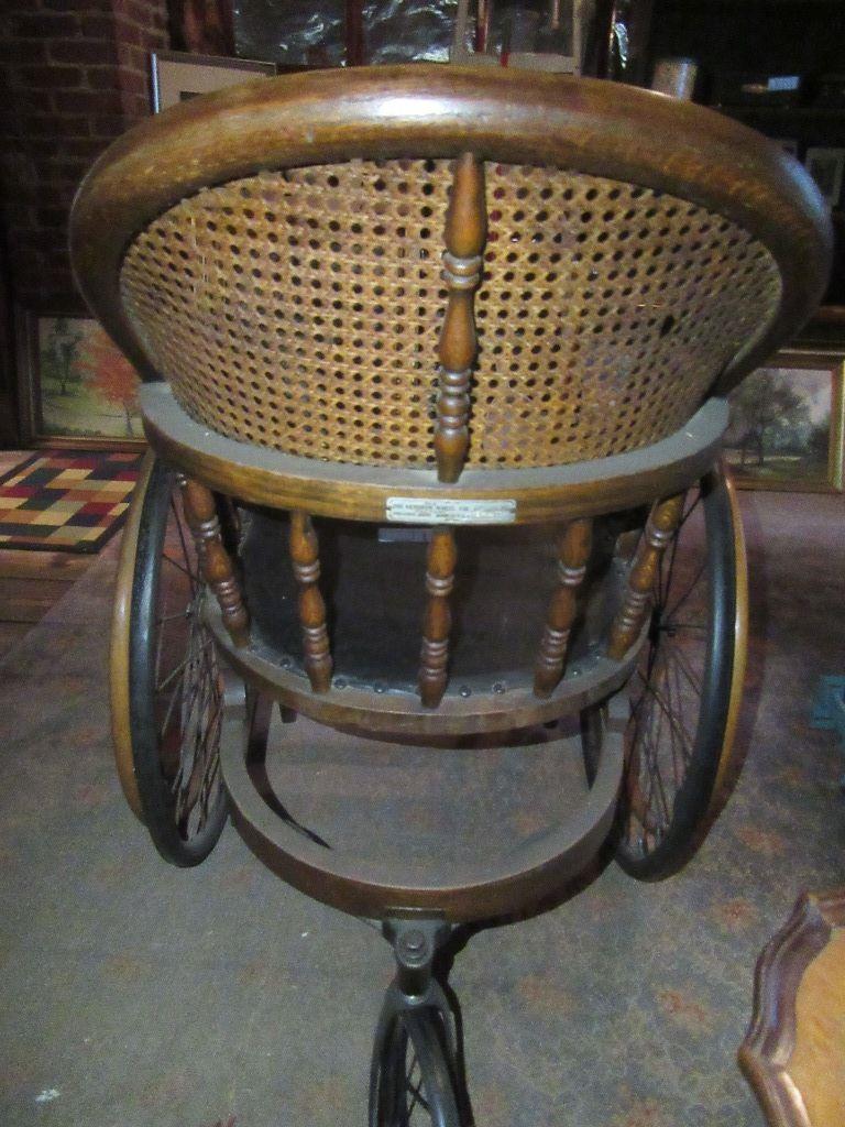 VINTAGE WOODEN WHEELCHAIR WITH CANE BACK