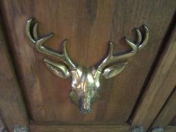 OAK FINISH GUN CABINET. GLASS RETAINERS NEED REPAIRED