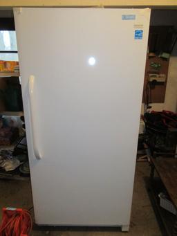 FRIGIDAIRE UPRIGHT FREEZER MODEL FFFH20F2QWC. DOES NOT HAVE KEY.