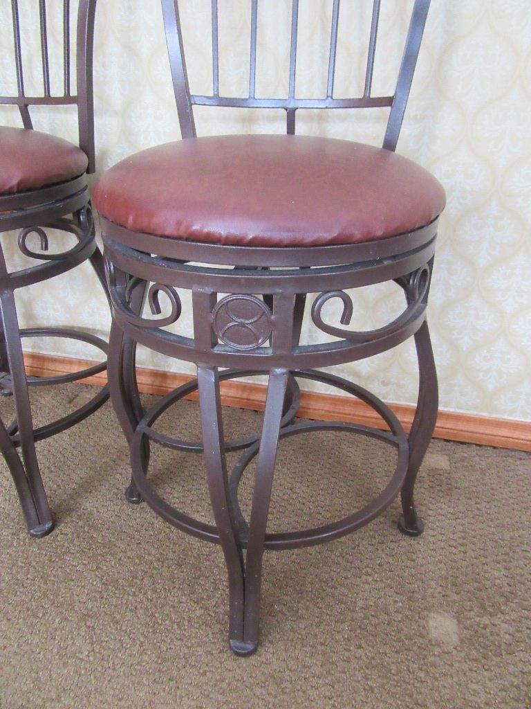 PAIR OF SWIVEL BAR STOOLS