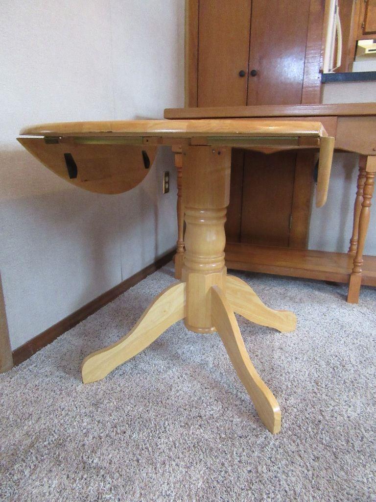 OAK DROP SIDE PEDESTAL TABLE