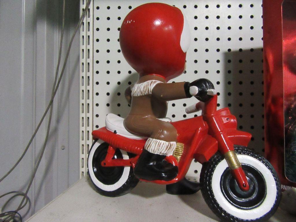 GIRL ON MOTORCYCLE FIGURINE