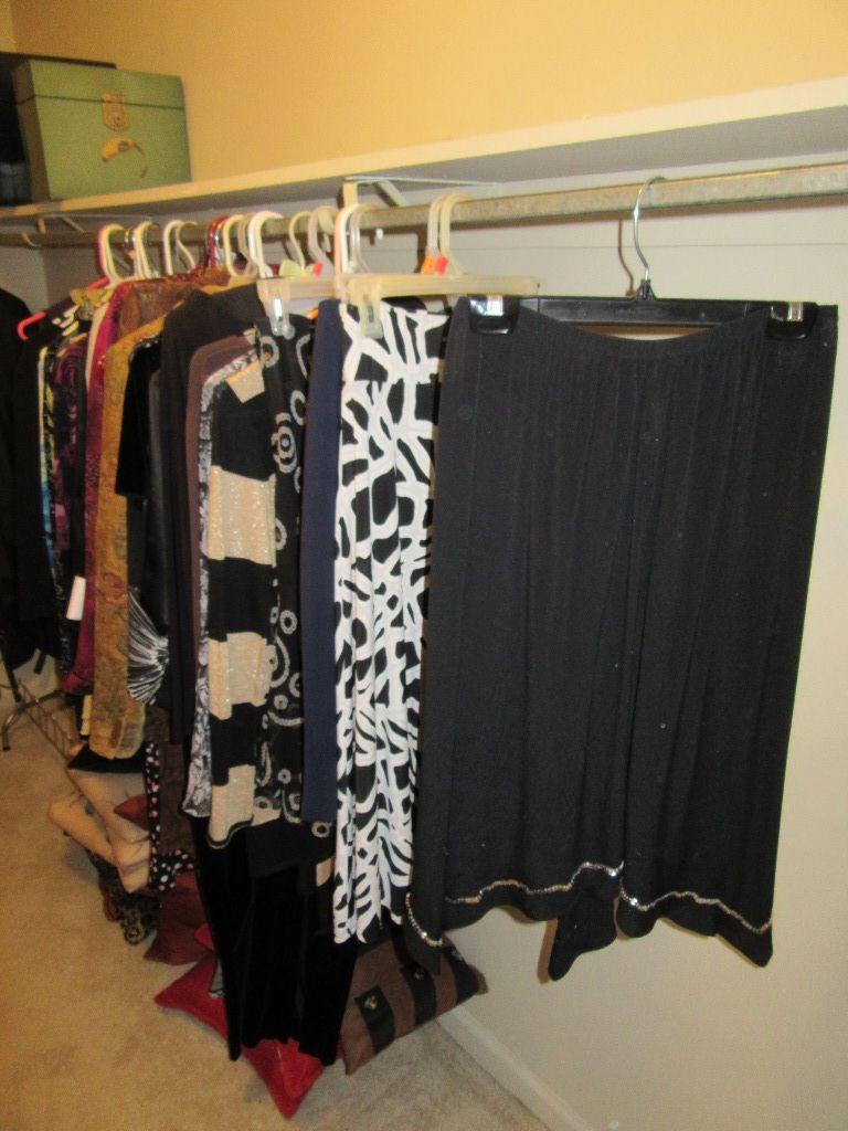 WOMEN'S CLOTHES ON RIGHT OF CLOSET. MOSTLY SIZE 6