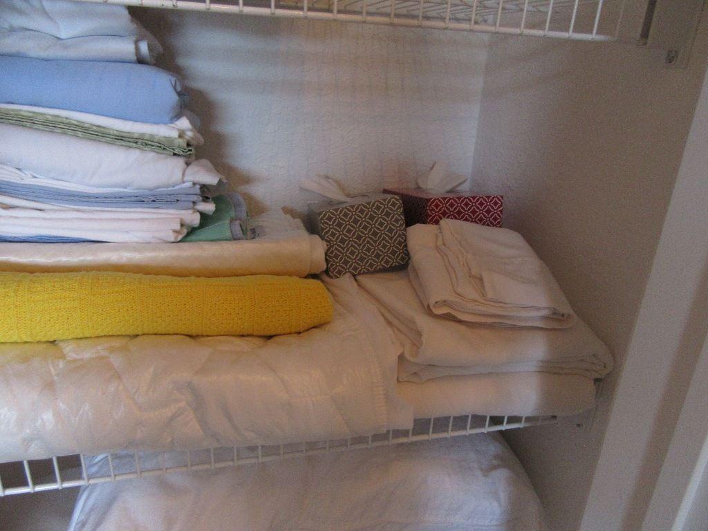 CONTENTS OF LINEN CLOSET INCLUDING BLANKETS, SHEETS, AND ETC