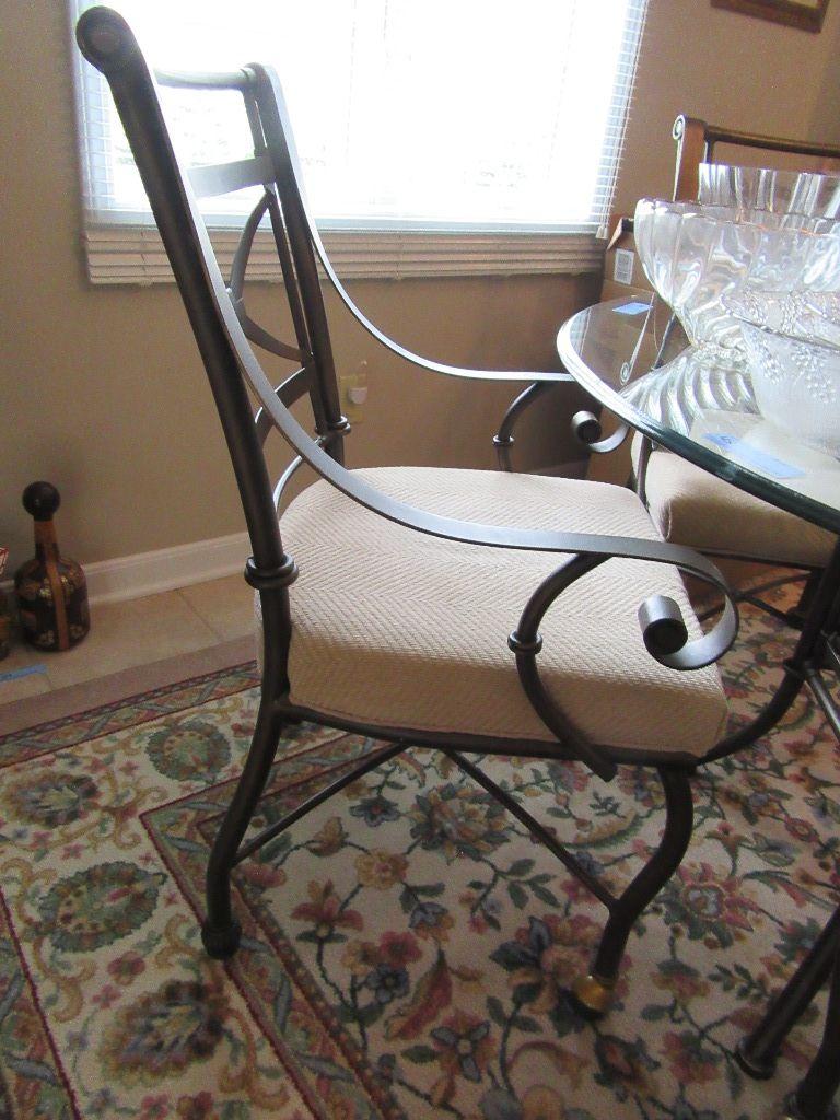 ROUND GLASS TOP TABLE WITH 4 MATCHING CHAIRS. ONE COASTER MISSING