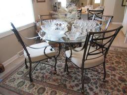 ROUND GLASS TOP TABLE WITH 4 MATCHING CHAIRS. ONE COASTER MISSING