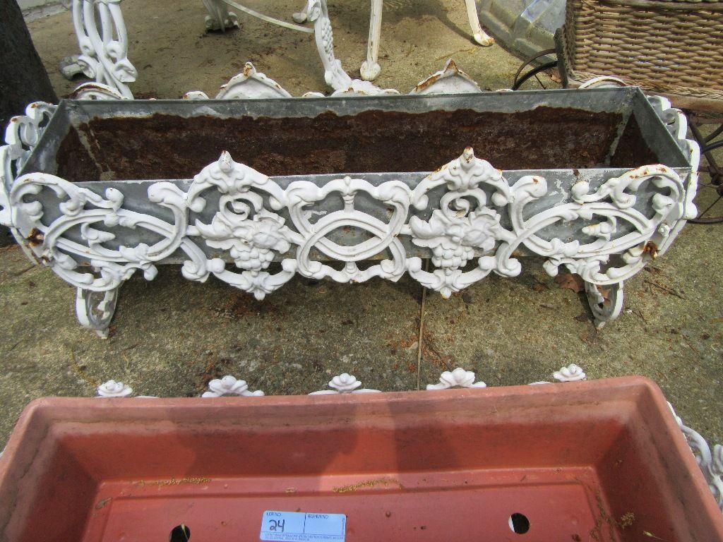 2 CAST IRON PLANTERS