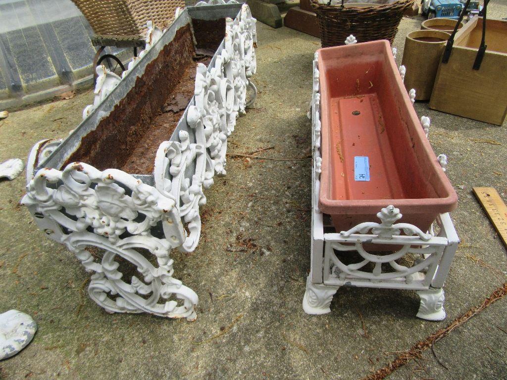 2 CAST IRON PLANTERS