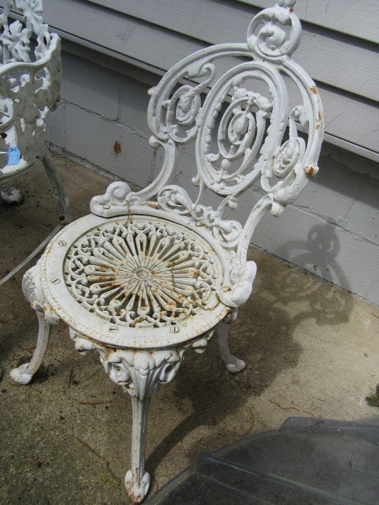 2 CAST IRON OUTDOOR CHAIRS