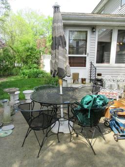 WROUGHT IRON UMBRELLA TABLE AND 4 CHAIRS