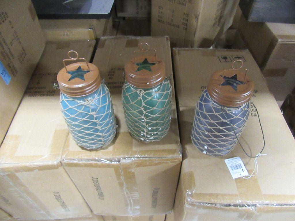 9 BOXES OF FISHING HANGING TABLETOP CANDLE JARS 3 ASSORTED. 12 PIECES PER B