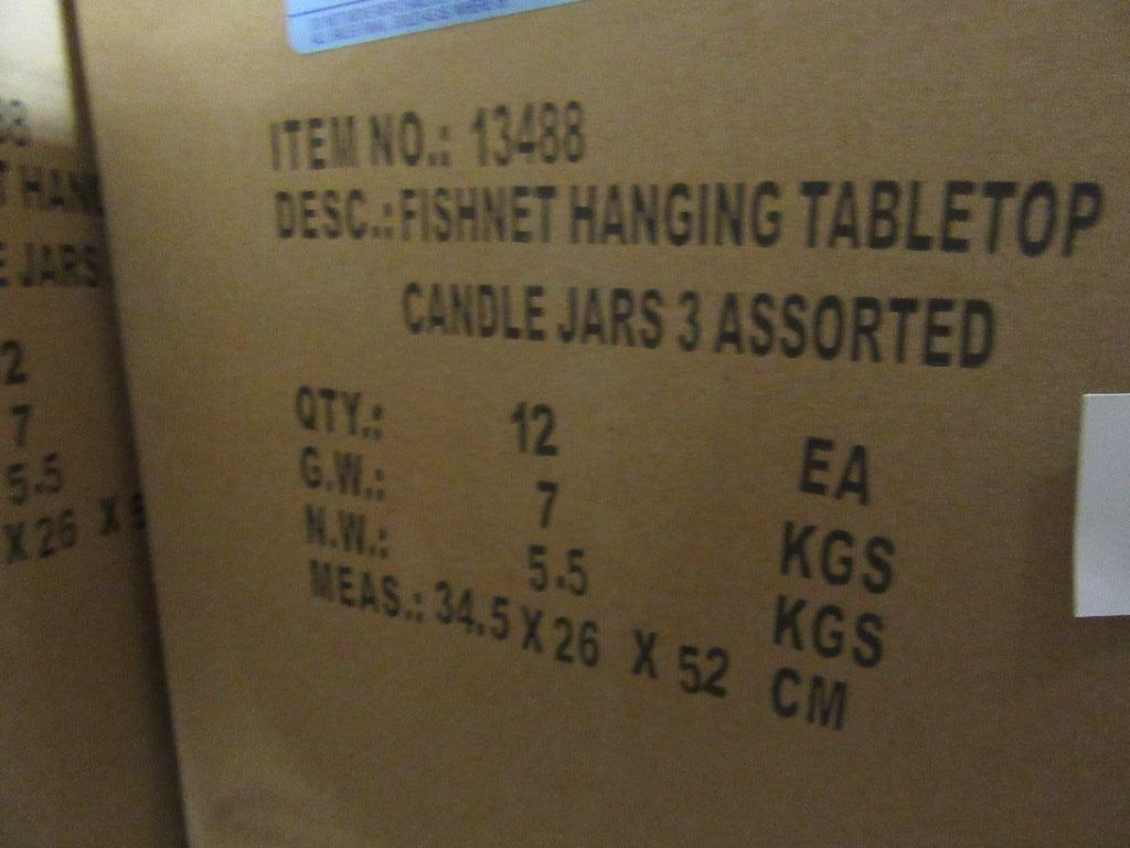 9 BOXES OF FISHING HANGING TABLETOP CANDLE JARS 3 ASSORTED. 12 PIECES PER B