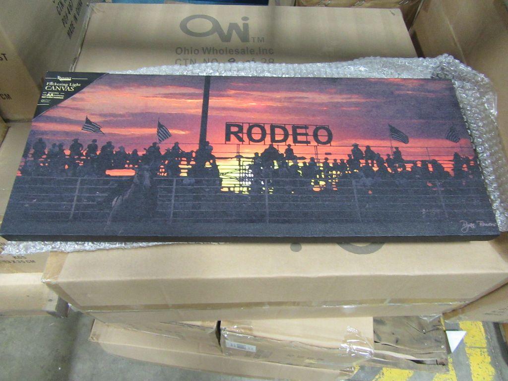 16 CASES OF LIGHTED STAND AT THE RODEO CANVAS. 8 PIECES PER CASE