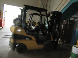 CAT FORKLIFT. SOLID TIRES. PROPANE. MODEL NUMBER C5000. NEEDS RADIATOR