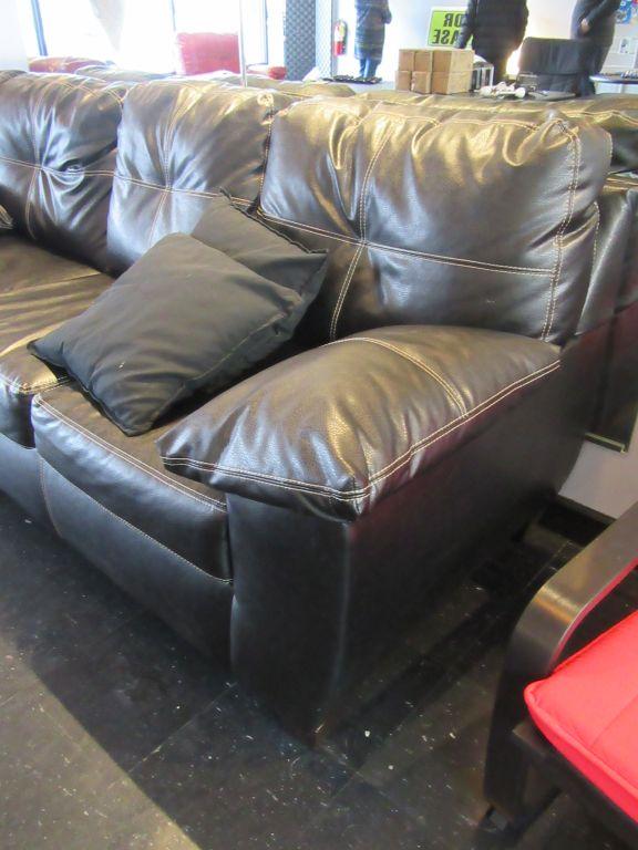 BROWN FAUX-LEATHER THREE CUSHION SOFA