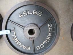 (4) 45 LB STEEL FREE WEIGHTS