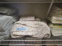 SIZE FULL SHEETS AND PILLOW CASES ON TWO SHELVES