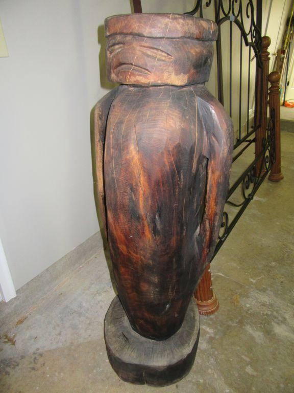 HAND-CARVED WOODEN VASE. APPROXIMATELY 4 FT TALL