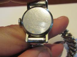 WOMEN'S KELTON WATCH. BASE METAL. BEZEL. STAINLESS STEEL BACK