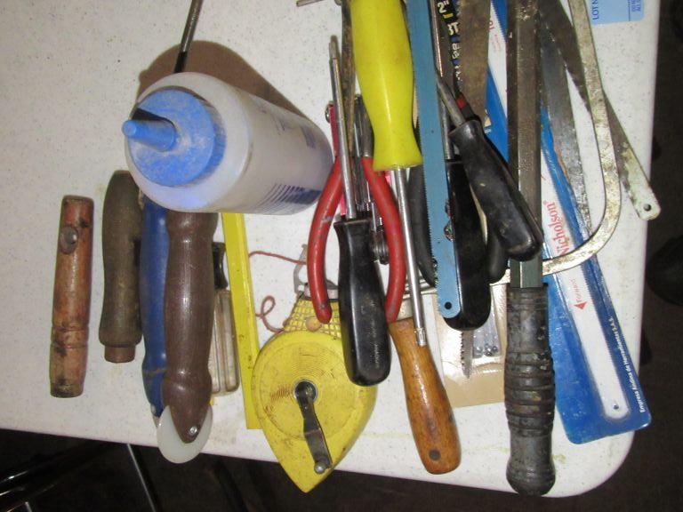 CHALK LINE. NEEDLE NOSE PLIERS. NAIL PULLER. SAW BLADES AND ETC
