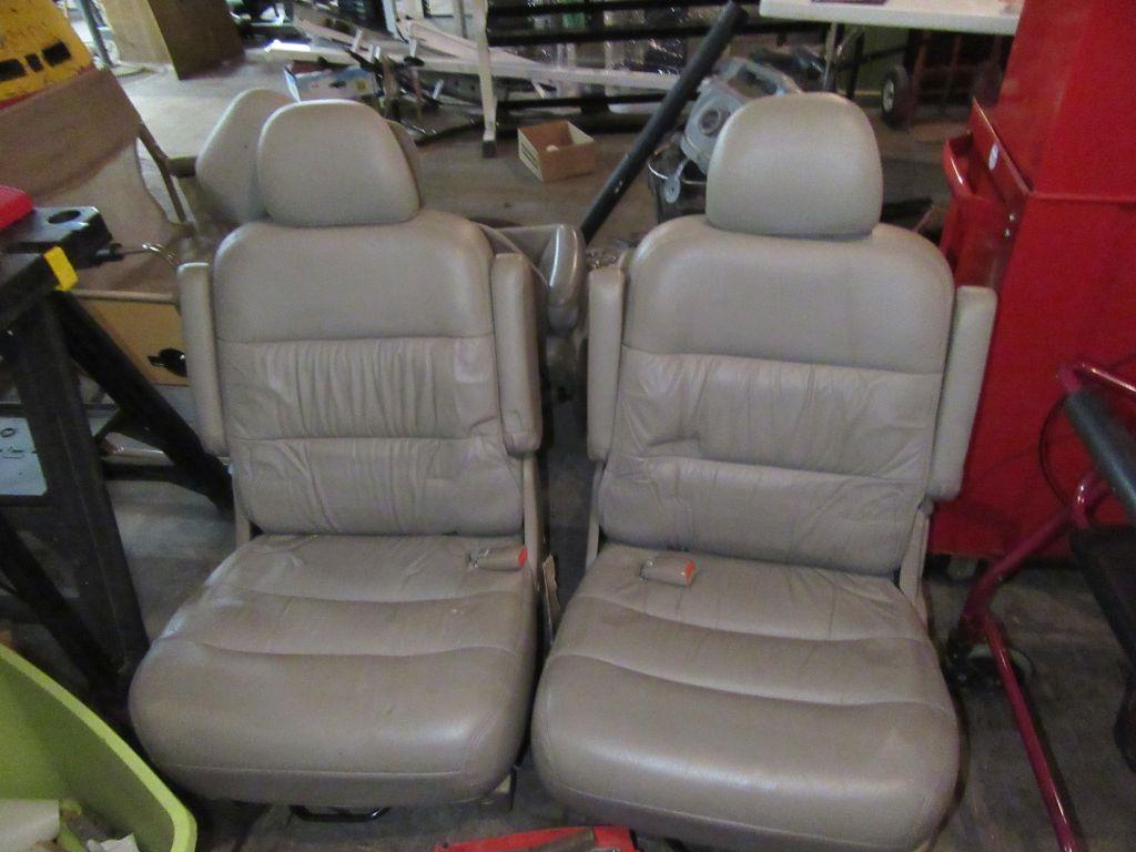 TAN LEATHER VAN SEATS. NOT SURE WHAT THEY FIT