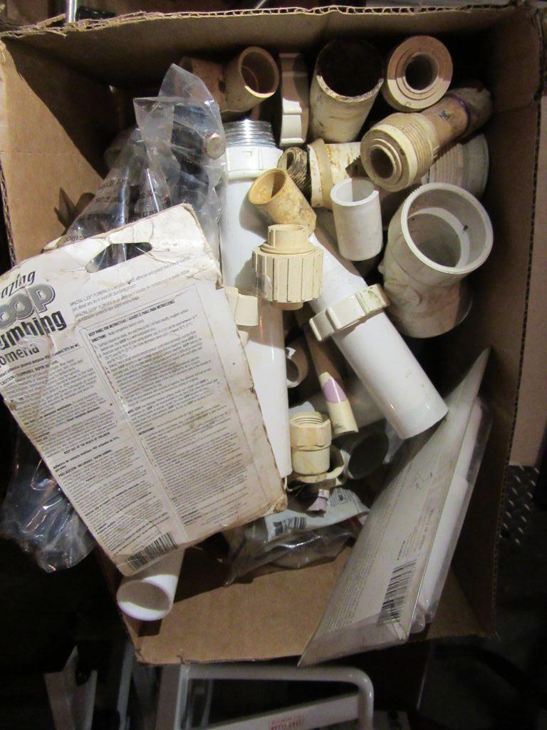 TWO BOXES OF PLUMBING FIXTURES AND SUPPLIES.