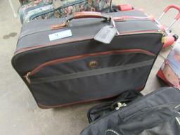 BLACK AND TAN LUGGAGE