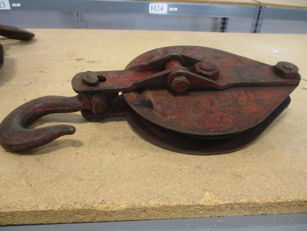 (4) ANTIQUE PULLEYS