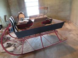 antique wooden and metal sleigh approximately 7 foot long