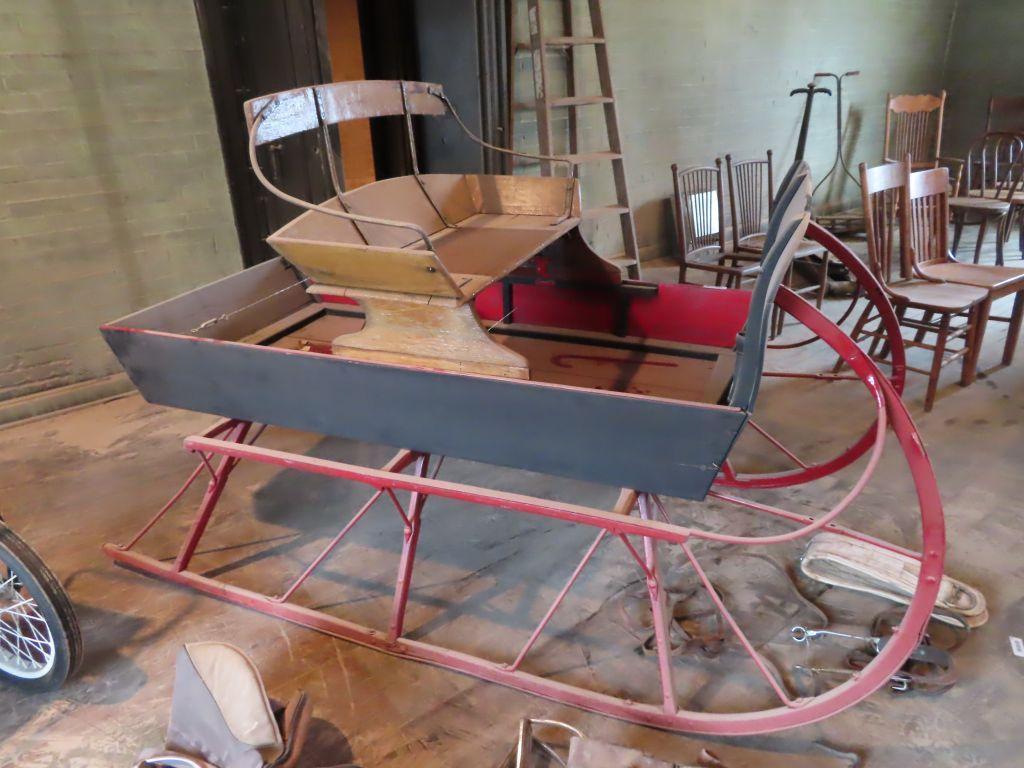 antique wooden and metal sleigh approximately 7 foot long