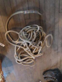 variety of horse tack including ropes. leads and Etc