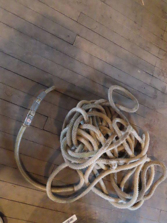 variety of horse tack including ropes. leads and Etc