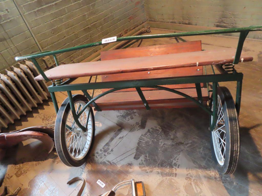 green sulky with Oak wood and pneumatic tires