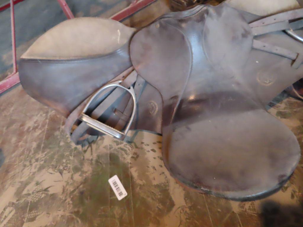 leather saddle with stirrups