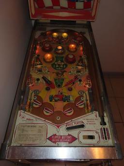 vintage Williams beat the clock pinball machine. in basement. bring tools and help for removal.