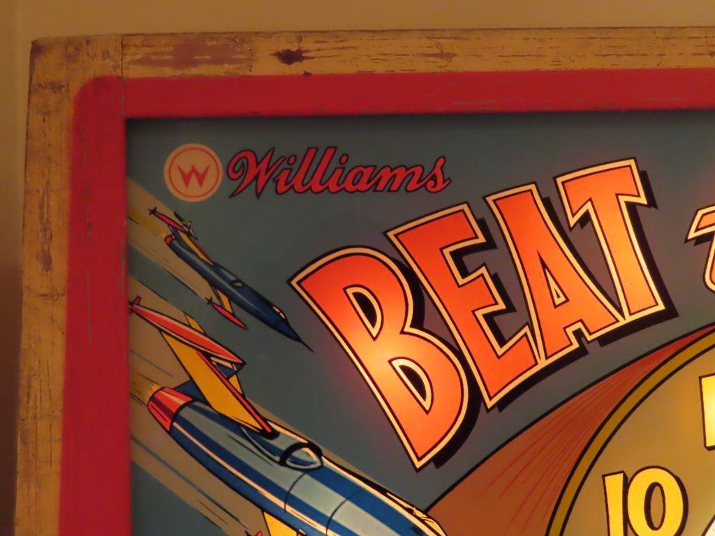 vintage Williams beat the clock pinball machine. in basement. bring tools and help for removal.