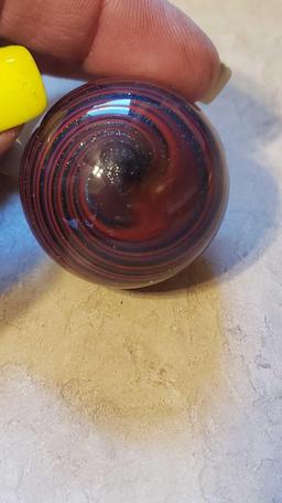 red and blue swirl with glitter marble signed Rick Davis, almost 1.5 in