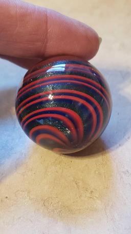 red and blue swirl with glitter marble signed Rick Davis, almost 1.5 in