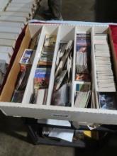 Lot of assorted cards in one five slot white box