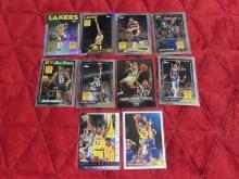 Lot of 10 Magic Johnson basketball cards in soft plastic