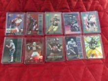 Lot of 10 football cards in hard plastic