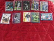 Lot of 10 baseball cards in hard and soft plastic cases