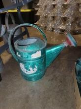 Metal green painted watering can