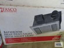 Bathroom heat/vent light, new in box and Universal rotisserie, new in box