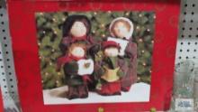 Set of four carolers with box