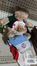 Stuffed bear and doll with doll clothes
