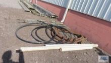 LOT OF HOSES AND METAL LADDER PARTS