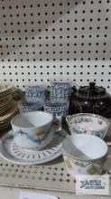 Vintage glasses, teapot made in England and tea cups