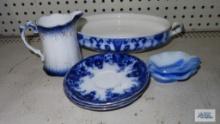 Flow blue plates, serving dish and pitcher